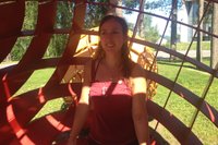 Sister inside a red round thing