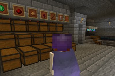 Sorting system with allays at the end, picking up totems of undying and enchanted books.